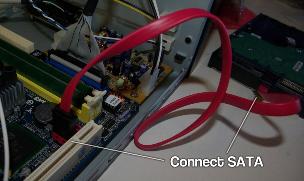 Connect SATA cable with Motherboard