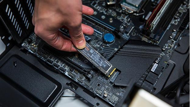 Once the PCIe M.2 slot is located remove the M.2 SSD