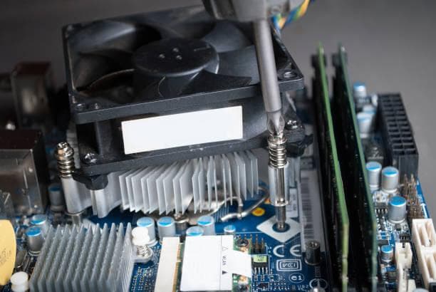 Take the CPU cooler and place its heat spreader